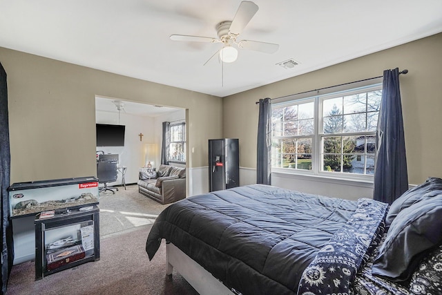 bedroom featuring carpet and ceiling fan