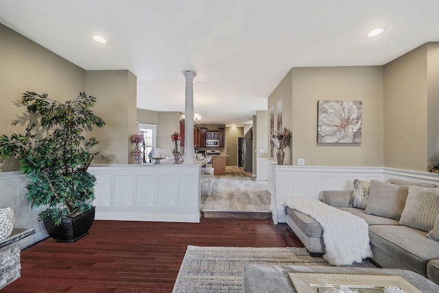 interior space with dark hardwood / wood-style flooring and a chandelier