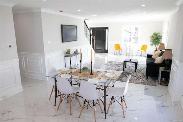 dining room with crown molding