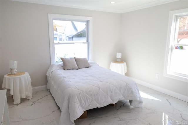 bedroom featuring multiple windows and ornamental molding