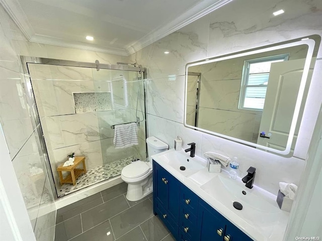 bathroom with a shower with shower door, crown molding, and tile walls