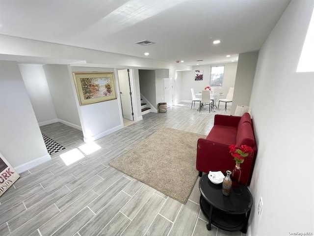 living room with light hardwood / wood-style floors