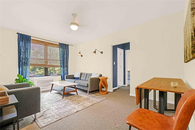 living room with carpet flooring and ceiling fan