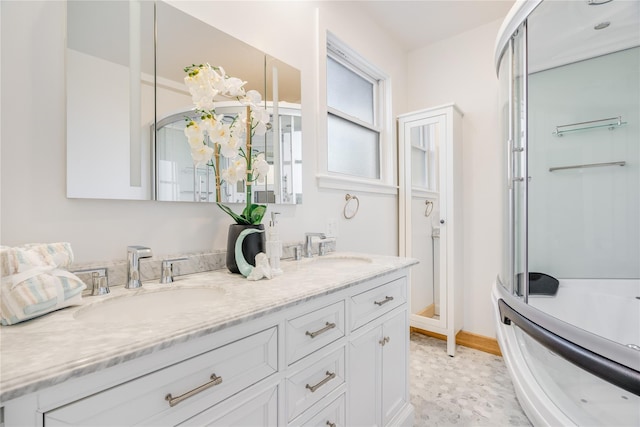 bathroom with vanity and walk in shower