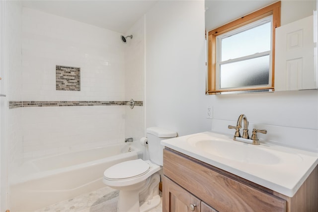 full bathroom featuring vanity, toilet, and tiled shower / bath