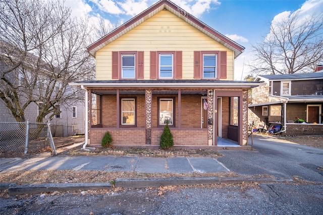 front of property featuring a porch