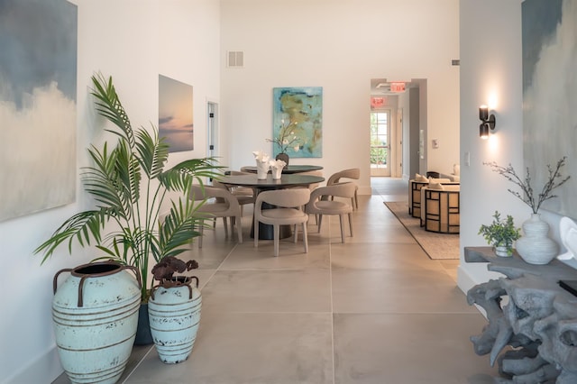 12 Depot Road 1302 (Pearl Way), Westhampton Beach, NY 11978 - dining room with a high ceiling