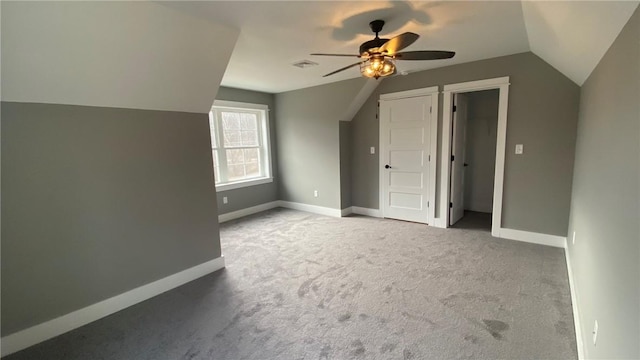 bonus room featuring carpet flooring, ceiling fan, and lofted ceiling