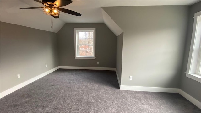 bonus room with carpet flooring, vaulted ceiling, and ceiling fan