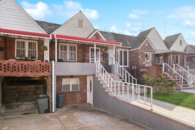 view of front of house with a garage and a porch