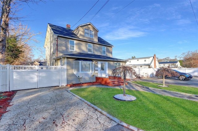 view of front property with a front yard