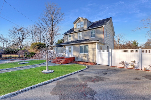 view of front of house with a front yard