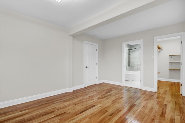 unfurnished room featuring light hardwood / wood-style flooring