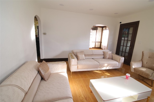 living room with light hardwood / wood-style flooring