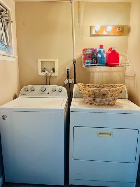 laundry room featuring washing machine and dryer