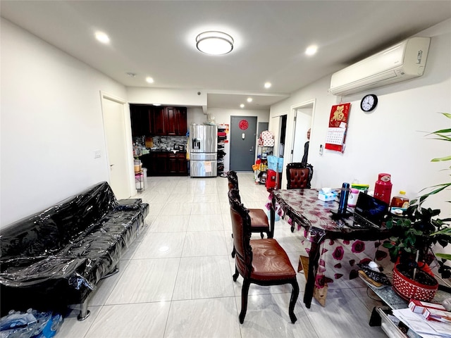 dining area featuring an AC wall unit