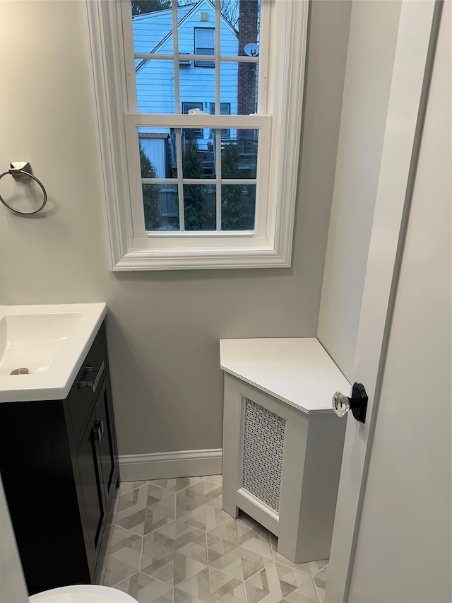 bathroom featuring tile patterned floors and vanity