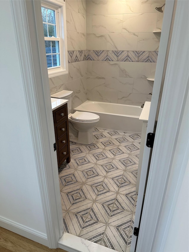 full bathroom with vanity, toilet, and shower / tub combination