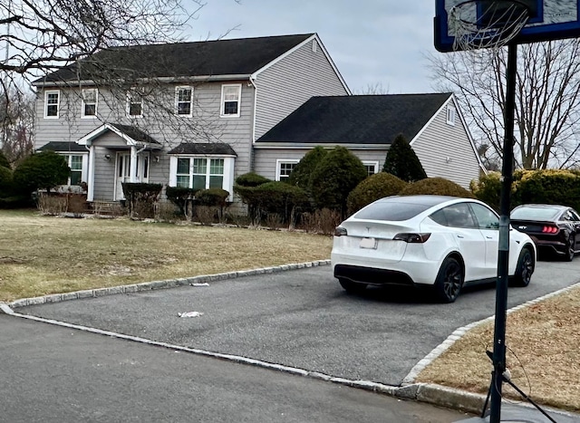 view of front of home with a front lawn