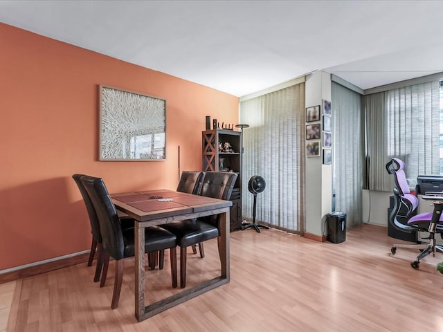 dining area with light wood-type flooring