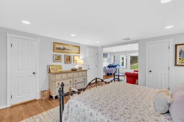 bedroom featuring wood-type flooring