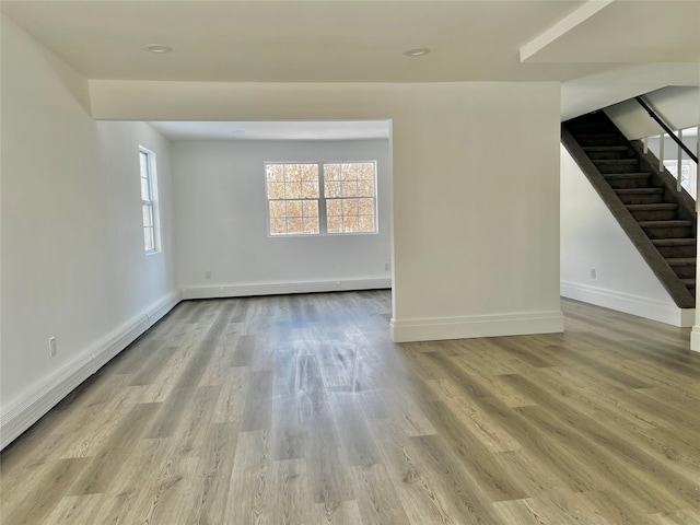 empty room with light wood-type flooring