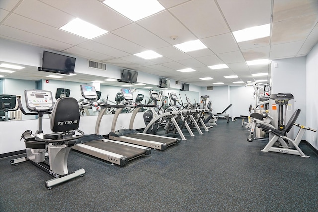 exercise room with a drop ceiling