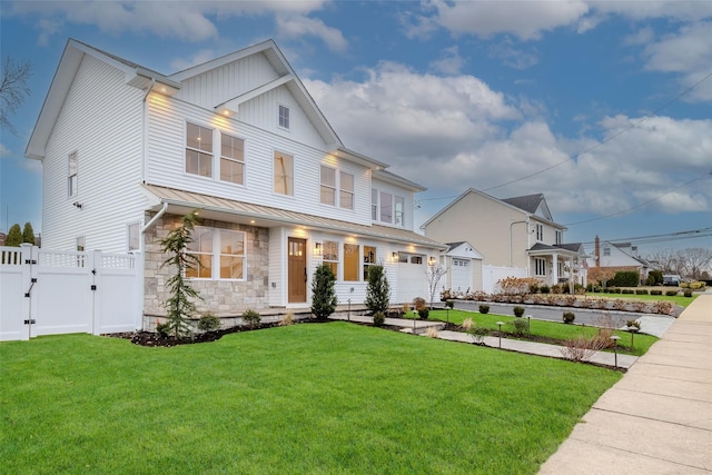 view of front facade featuring a garage and a front yard