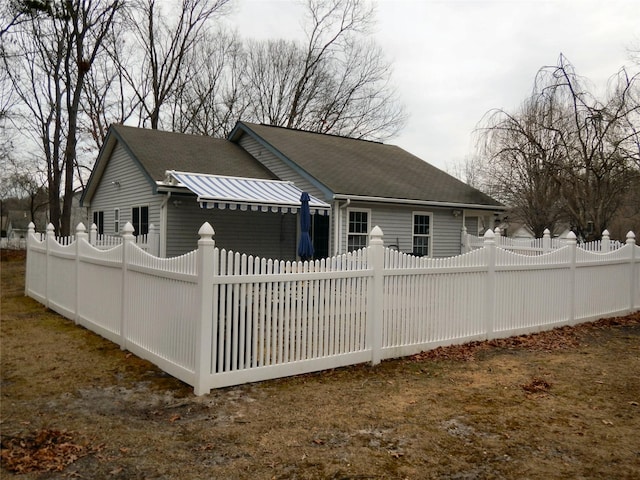 rear view of property with fence private yard