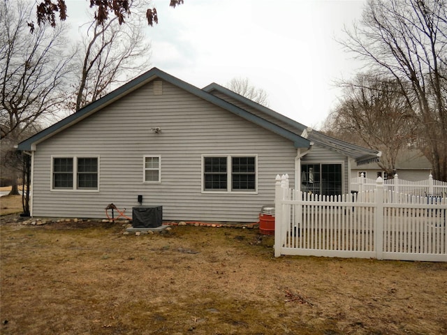 back of property with fence