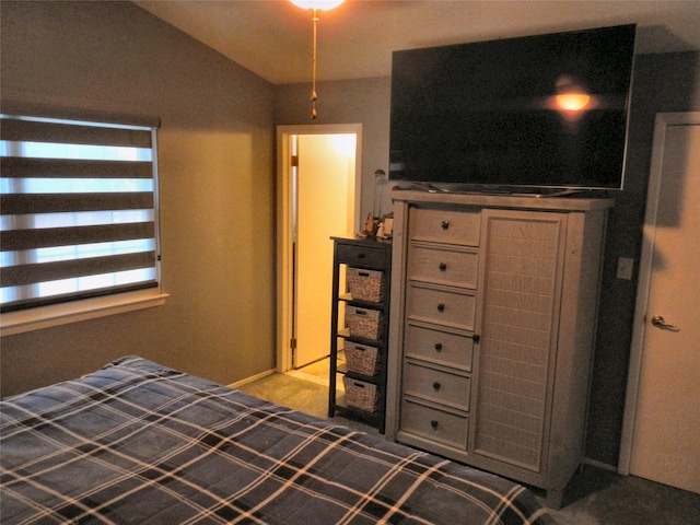 unfurnished bedroom with vaulted ceiling