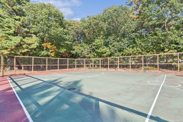 11 Westchester Ct, Middle Island, NY 11953 - view of sport court featuring community basketball court and fence