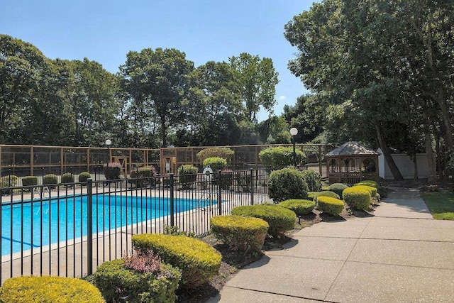11 Westchester Ct, Middle Island, NY 11953 - community pool featuring a gazebo, a patio, and fence