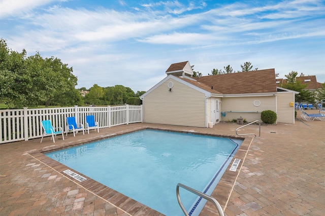 view of pool with a patio