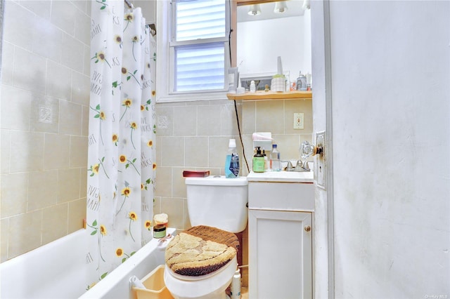 full bathroom with vanity, toilet, and shower / bath combo with shower curtain