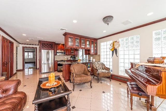 interior space with crown molding