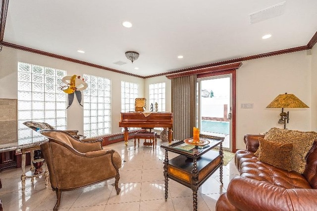 living room with light tile patterned floors and crown molding