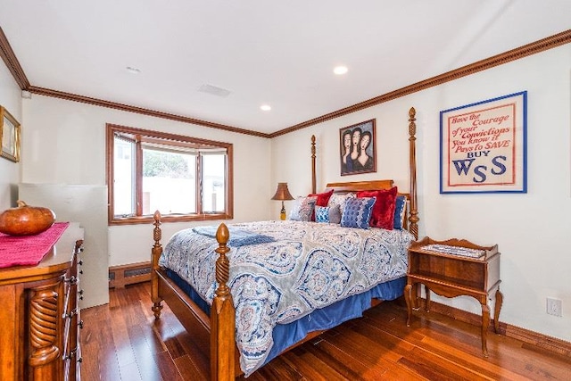 bedroom featuring dark hardwood / wood-style flooring, a baseboard radiator, and ornamental molding