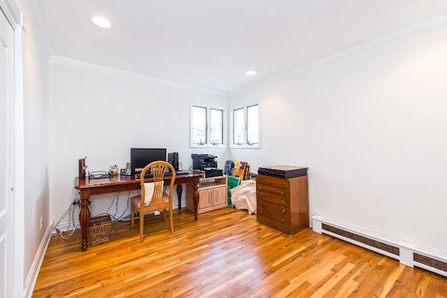 office area with light hardwood / wood-style floors, crown molding, and a baseboard radiator