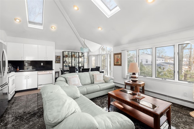 living room with a baseboard heating unit, high vaulted ceiling, and a skylight