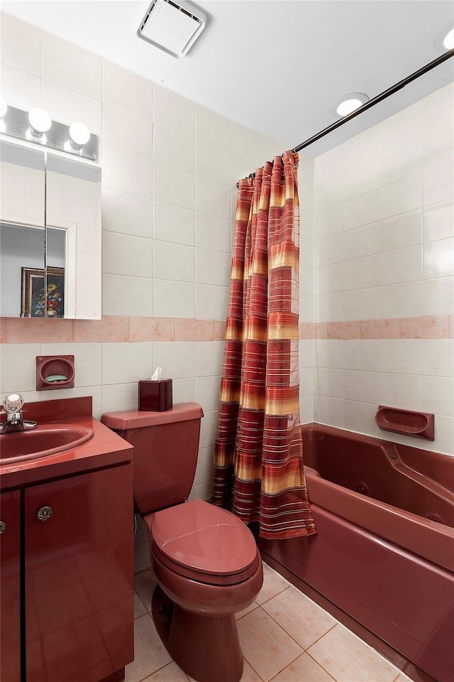 full bath with shower / bath combo, toilet, tile patterned flooring, vanity, and tile walls