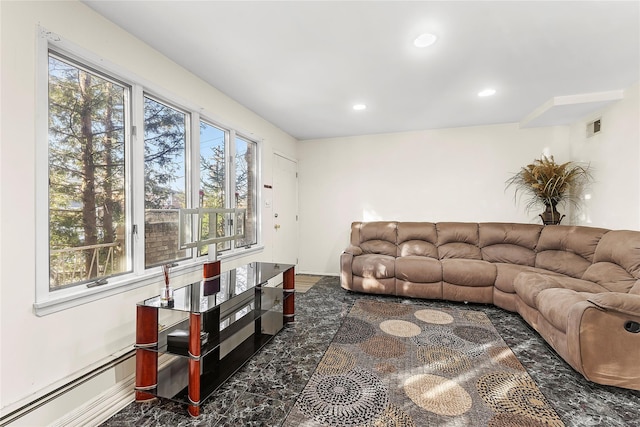 living room with visible vents, baseboard heating, and recessed lighting