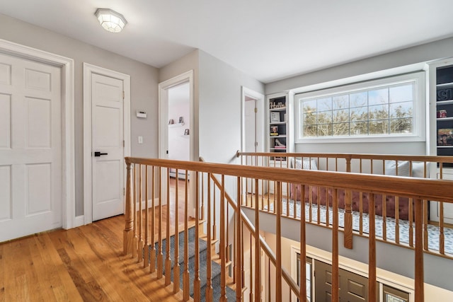 corridor featuring hardwood / wood-style flooring