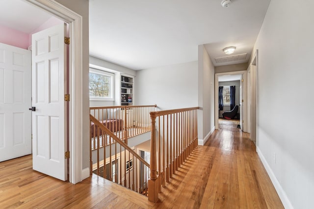 hallway with light wood-type flooring