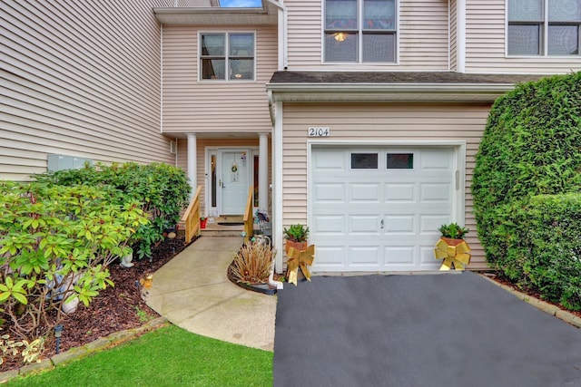 property entrance with a garage