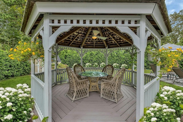 wooden terrace featuring a gazebo