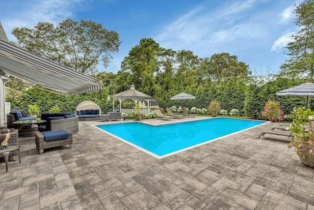 view of pool featuring a gazebo and a patio area