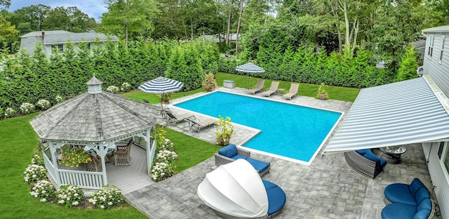 view of pool featuring a gazebo, a yard, and a patio