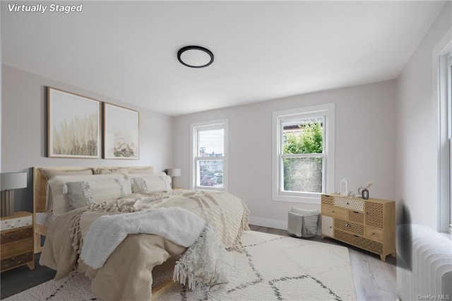 bedroom featuring light wood-type flooring