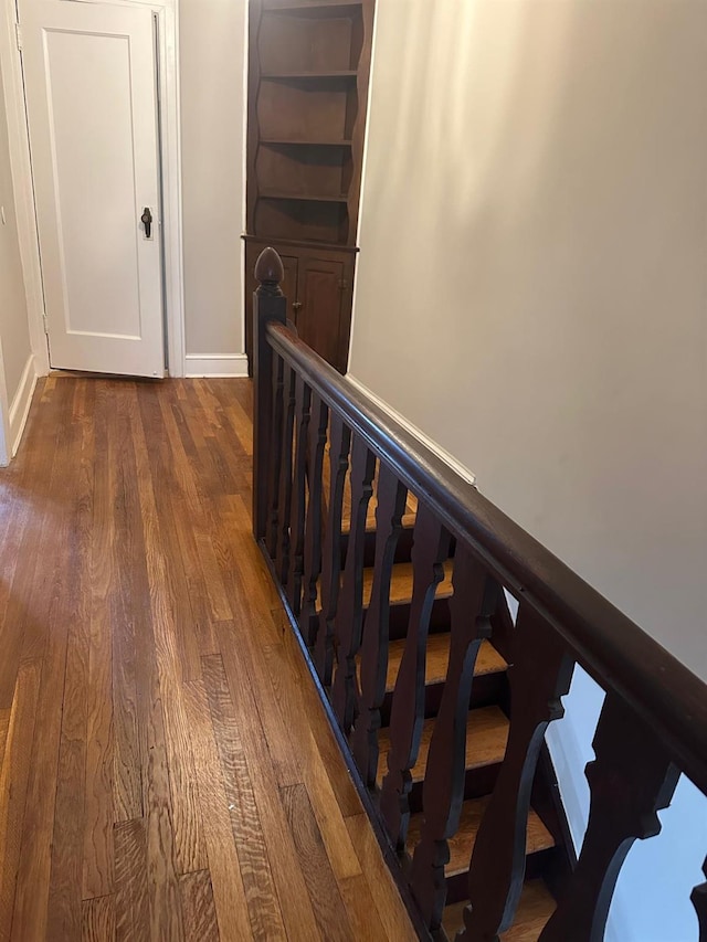 hallway featuring hardwood / wood-style floors